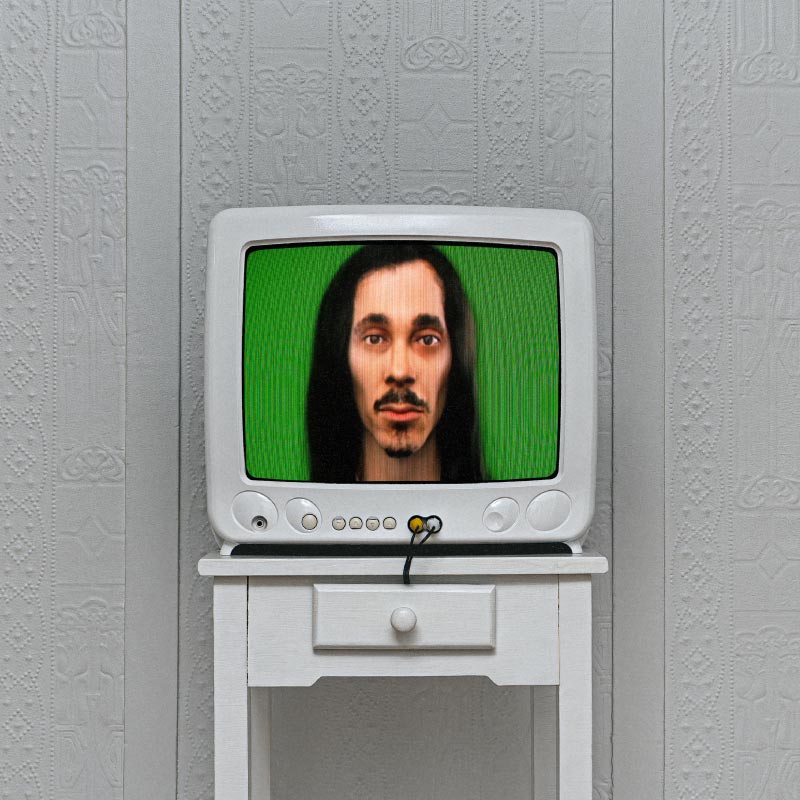 cover art: 3D render of lubalin over a green background on a tube TV atop a white dresser